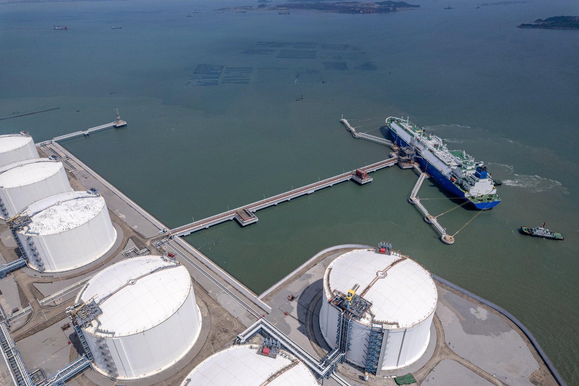 Aerial view of a ship transporting LNG at the seaside terminal